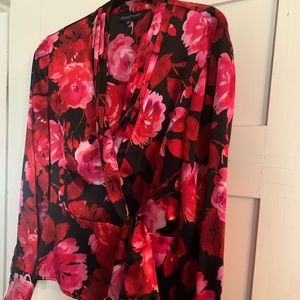 New York and Company Satin Floral wrap around blouse. Size Medium. New